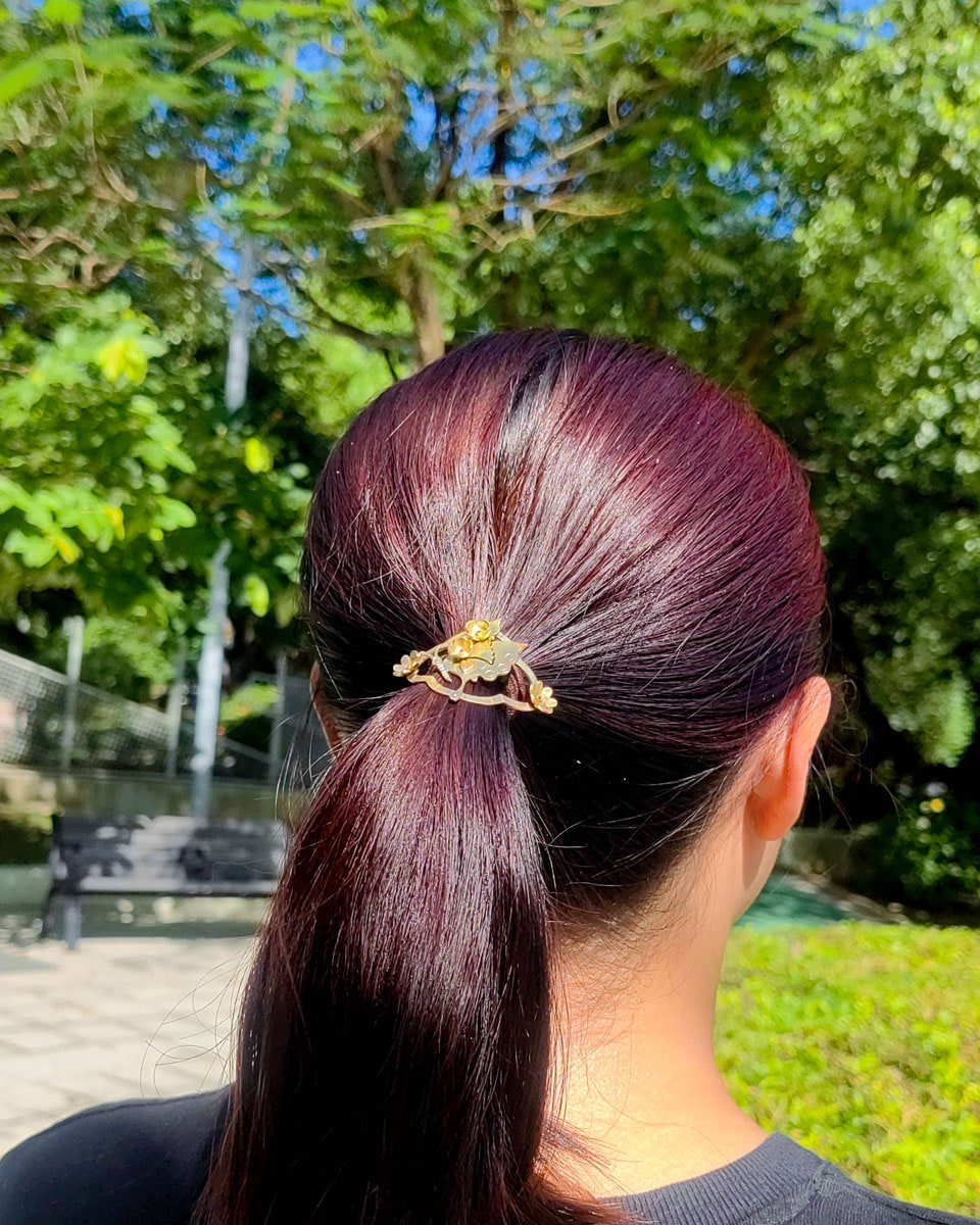 Butterfly hair cuff with a smiley face in brass with floral and heart designs, pony tail hook handmade by fake plastic love