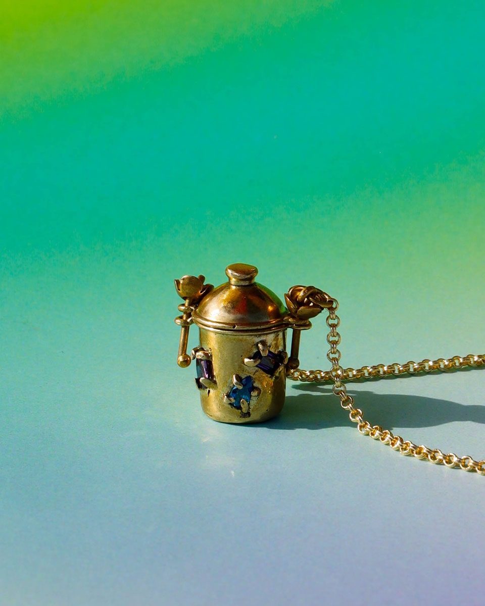 The Alchemist Locket Necklace, a handmade brass tiny container locket with cz stones and flowers details with gold plated chain, crafted by fake plastic love