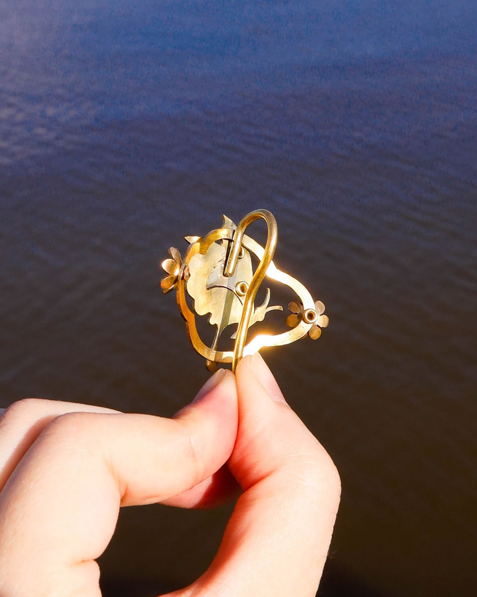 Butterfly hair cuff with a smiley face in brass with floral and heart designs, pony tail hook handmade by fake plastic love