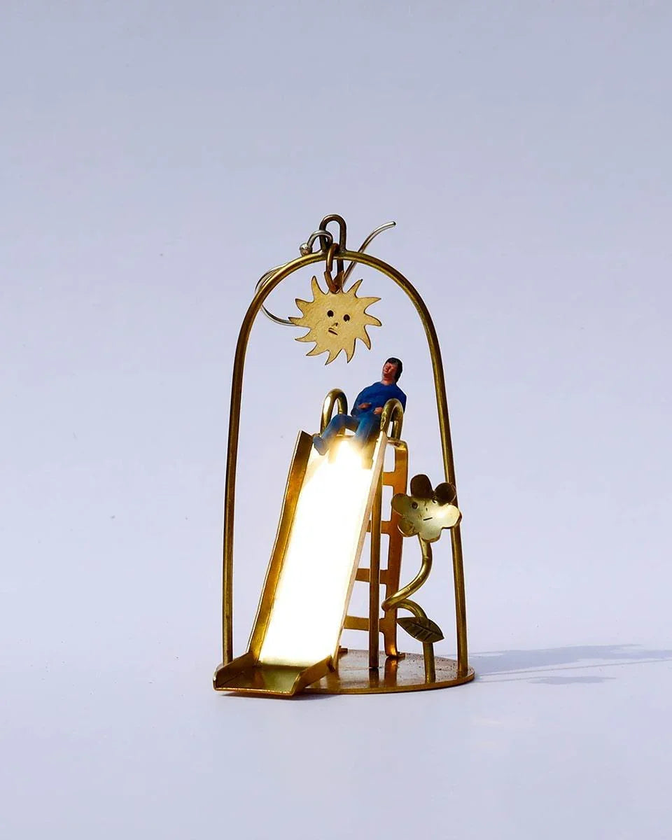 Sunny Day Playground Earrings, handmade miniature slide and seesaw with a kinetic element, made with metal folding technique, by fake plastic love