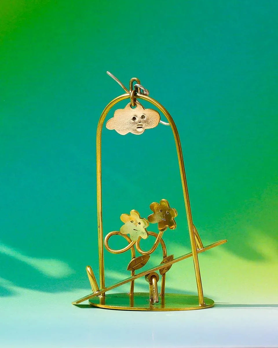 Sunny Day Playground Earrings, handmade miniature seesaw with a kinetic element, made with metal folding technique, by fake plastic love
