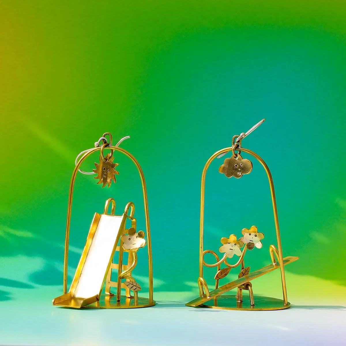Sunny Day Playground Earrings, handmade miniature slide and seesaw with a kinetic element, made with metal folding technique, by fake plastic love