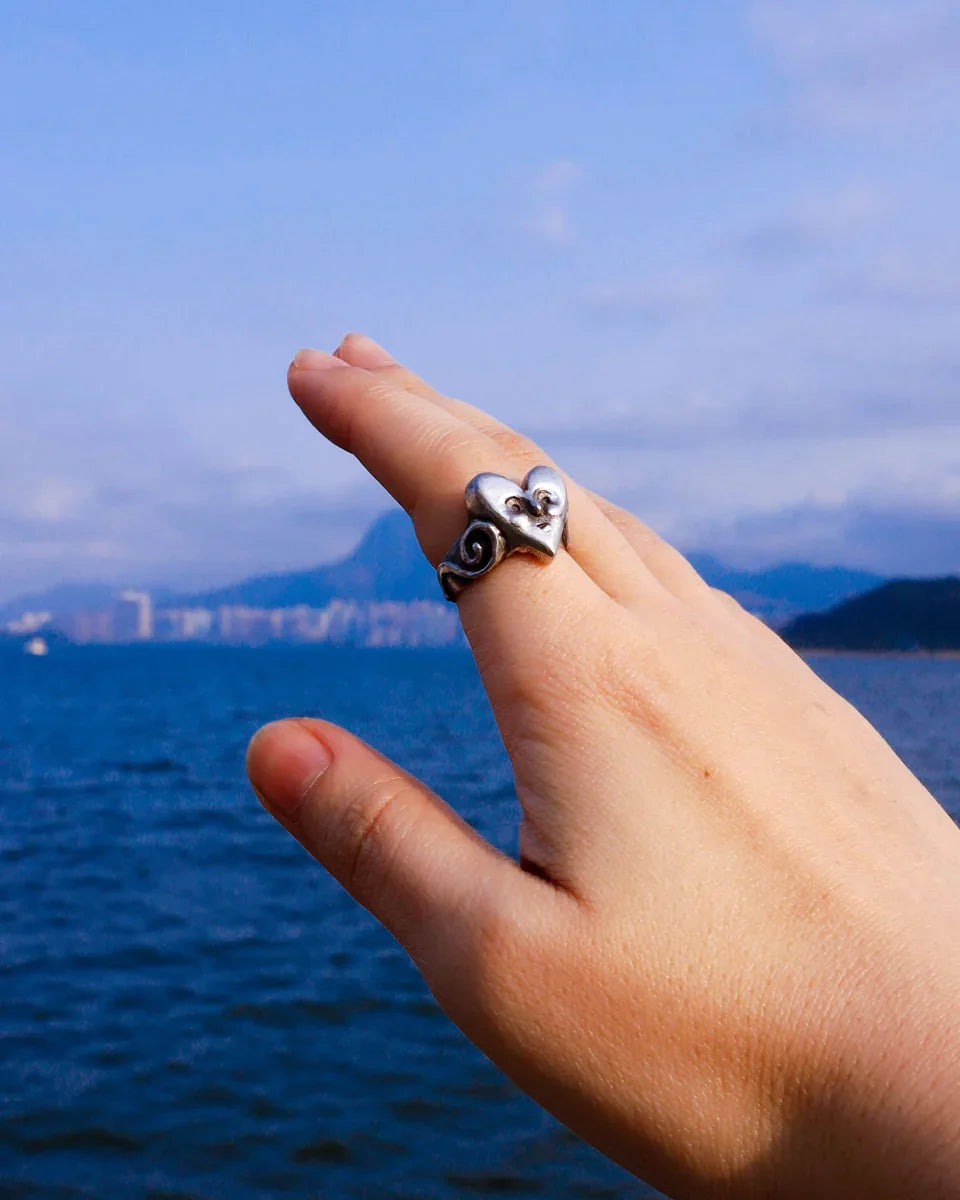 heart face sterling ring with a spiral pattern on the ring band, handmade with lost wax casting, by fake plastic love