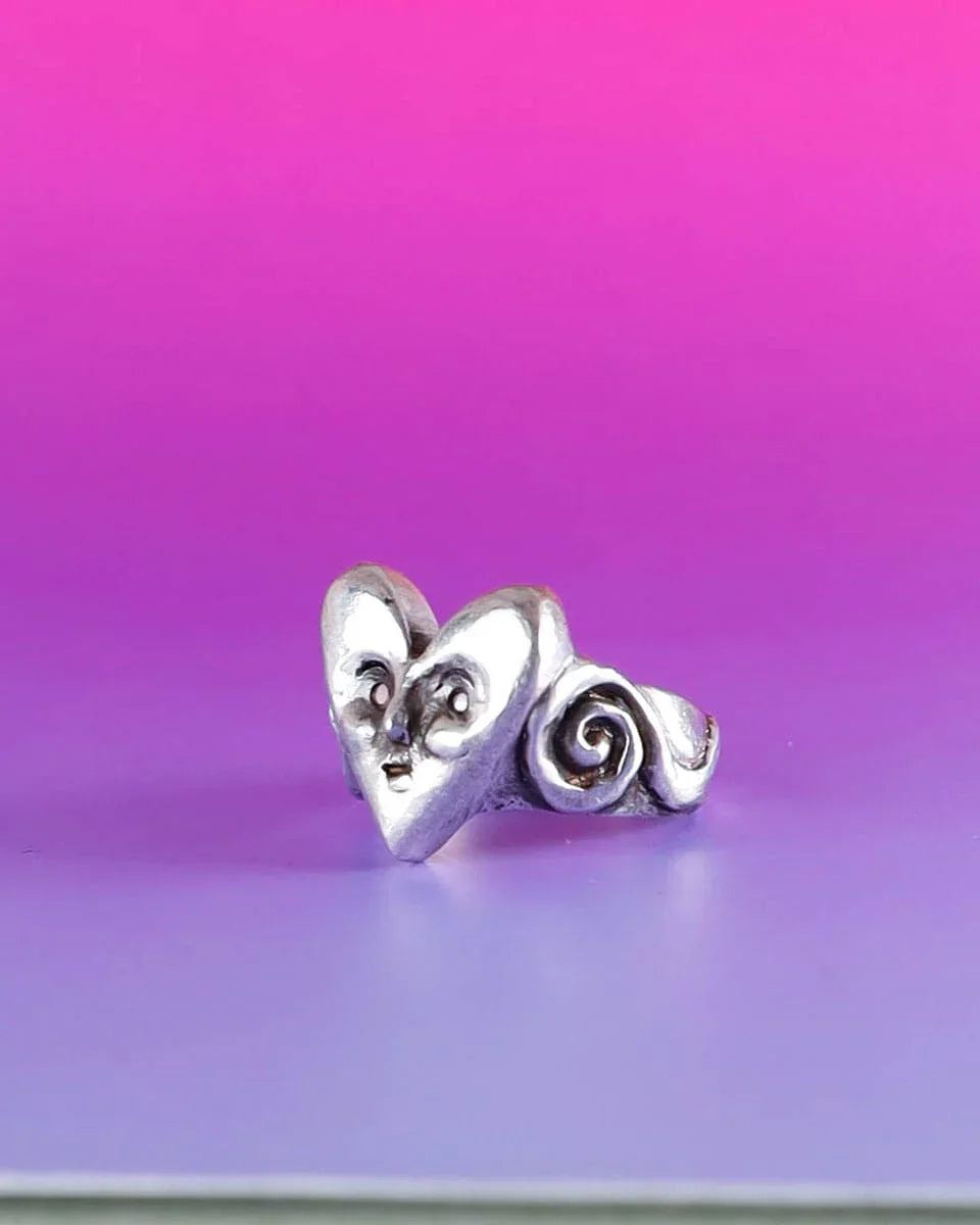 heart face sterling ring with a spiral pattern on the ring band, handmade with lost wax casting, by fake plastic love