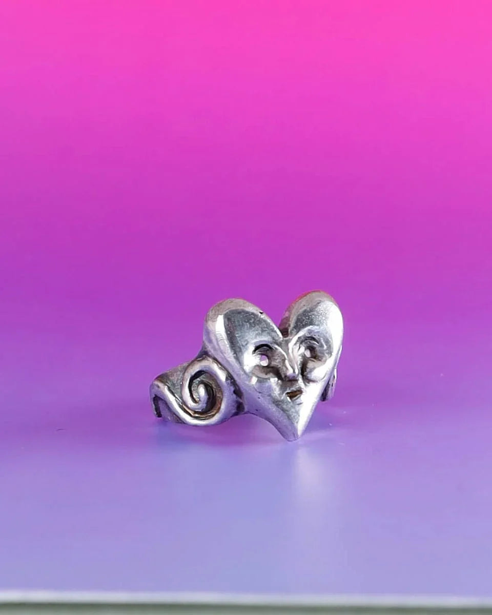 heart face sterling ring with a spiral pattern on the ring band, handmade with lost wax casting, by fake plastic love