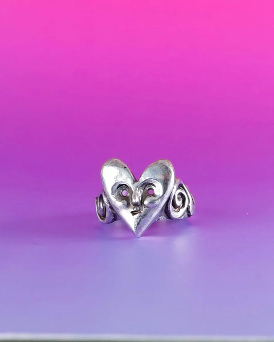 heart face sterling ring with a spiral pattern on the ring band, handmade with lost wax casting, by fake plastic love