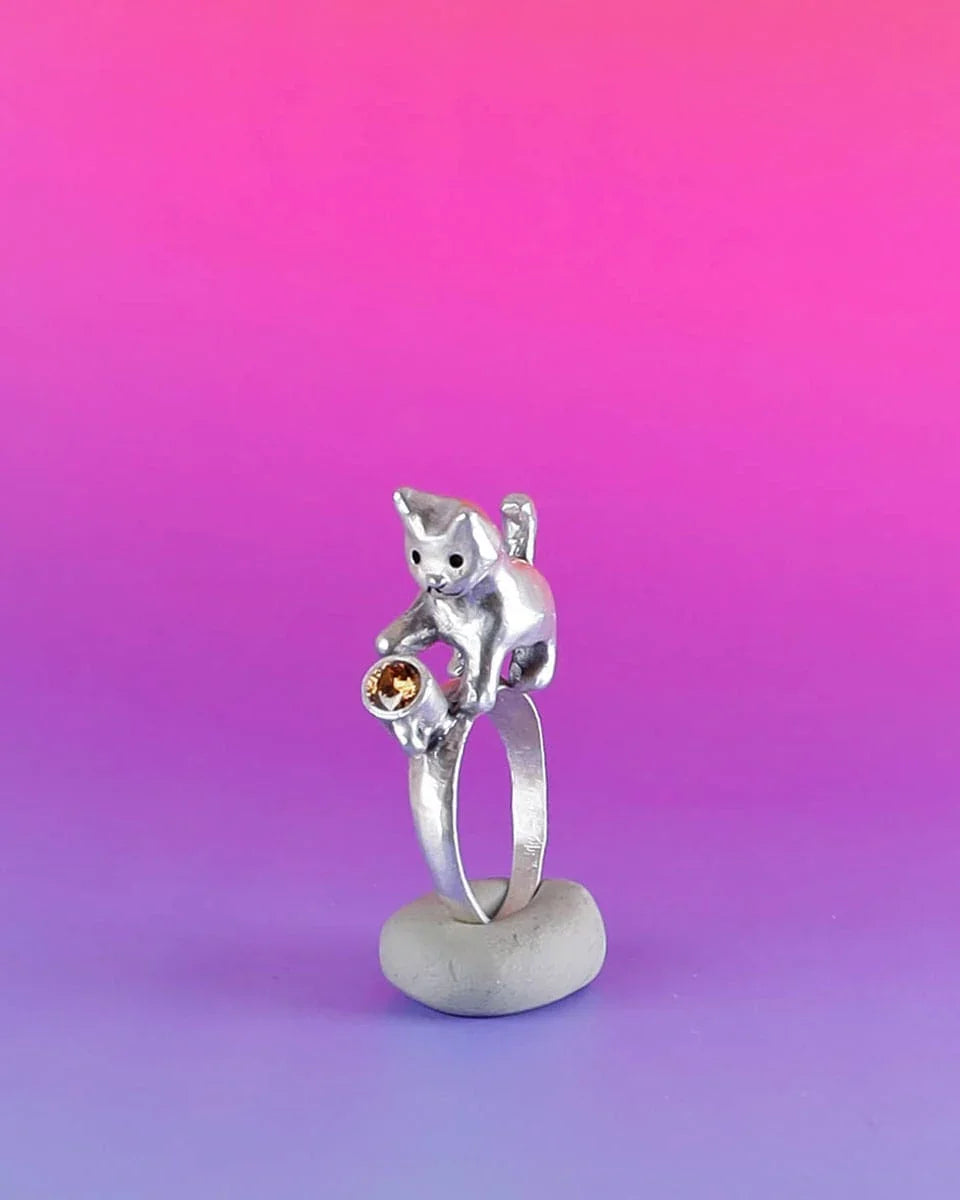 naughty kitty sterling silver ring, cat pushing cup off table, handmade jewellery, by fake plastic love