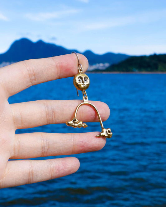 The Moon's Blessing celestial dangle earring in solid brass, featuring a full moon and two auspicious cloud