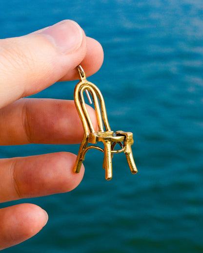miniature chair with socks brass earring, handcrafted wearable sculpture