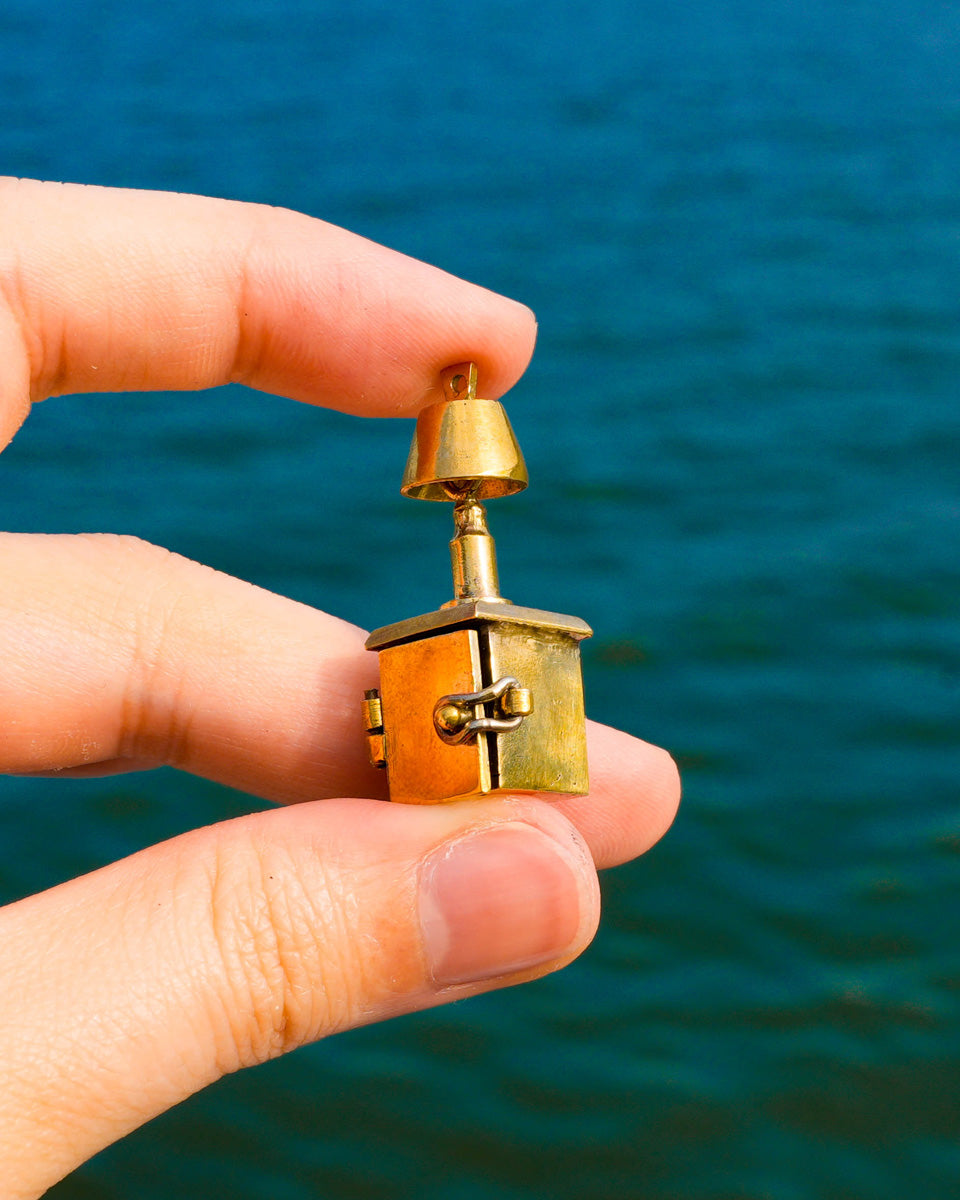 miniature bedside table locket earring with hinge opening in brass