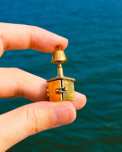 miniature bedside table locket earring with hinge opening in brass