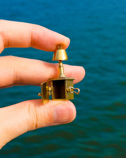 miniature bedside table locket earring with hinge opening in brass