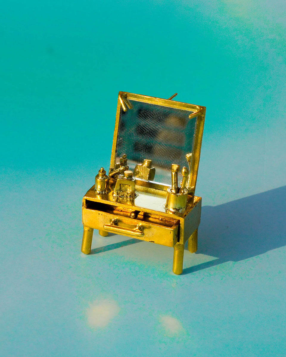 close up of handmade miniature Vanity table Jewellery - Functional Drawer and Mirror Pendant/Earring in brass