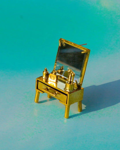 close up of handmade miniature Vanity table Jewellery - Functional Drawer and Mirror Pendant/Earring in brass