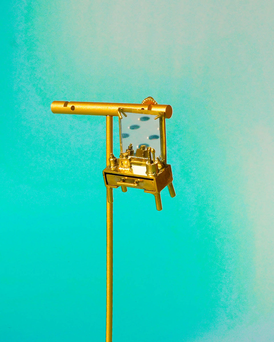 close up of handmade miniature Vanity table Jewellery - Functional Drawer and Mirror Pendant/Earring in brass