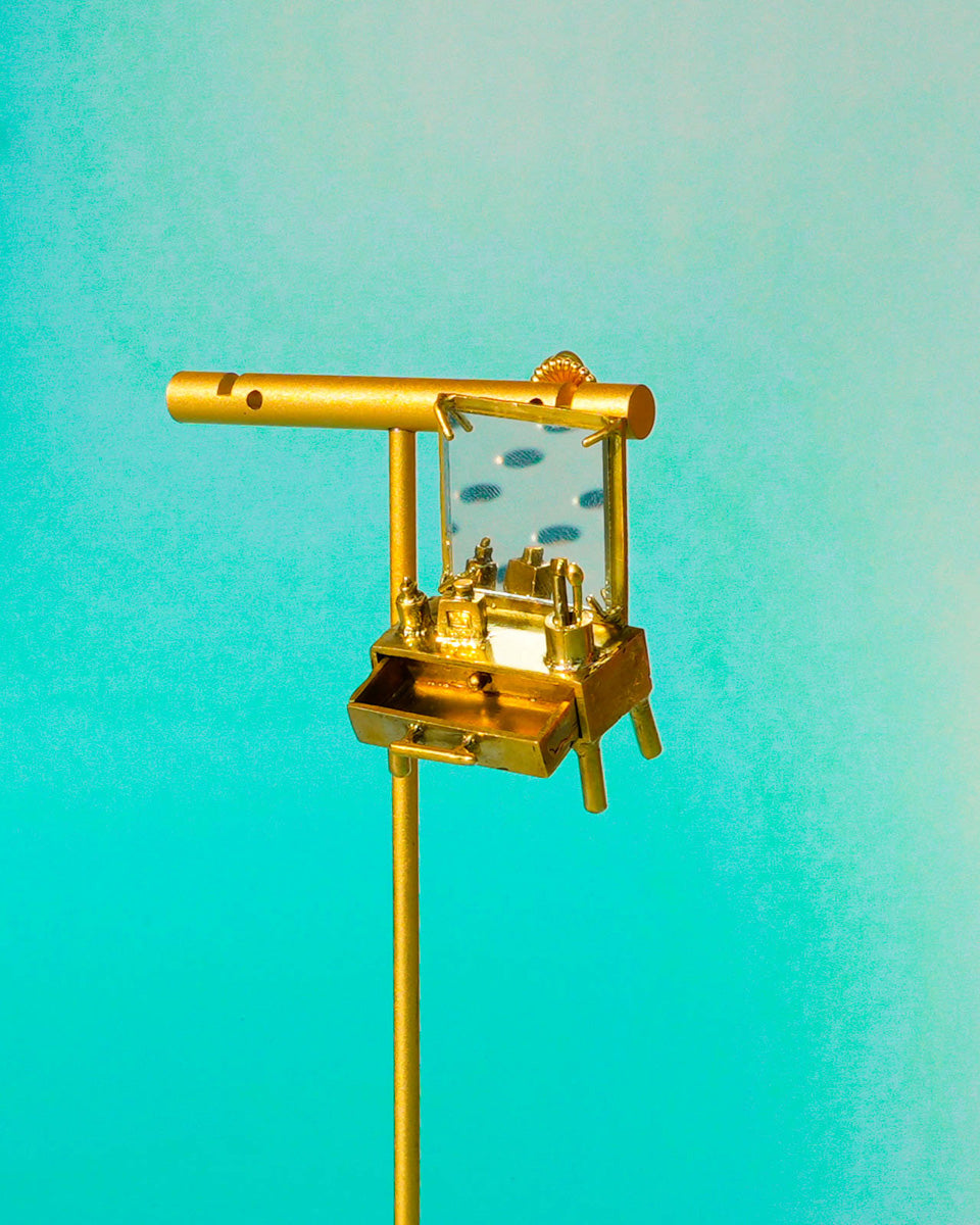 close up of handmade miniature Vanity table Jewellery - Functional Drawer and Mirror Pendant/Earring in brass