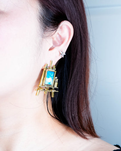 Miniature painting stand statement earring worn on ear, artist studio inspired jewelry