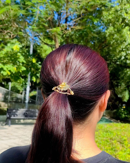 Butterfly hair cuff with a smiley face in brass with floral and heart designs, pony tail hook handmade by fake plastic love