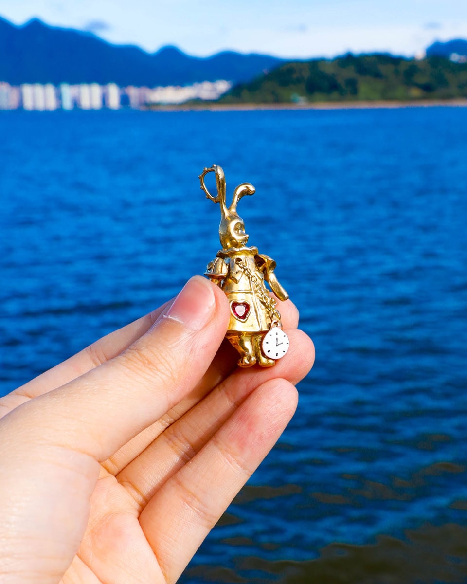 Articulated White Rabbit pendant with moving parts, Alice in wonderland inspired handmade jewellery, with enamel clock, and magenta CZ stone, by fake plastic love