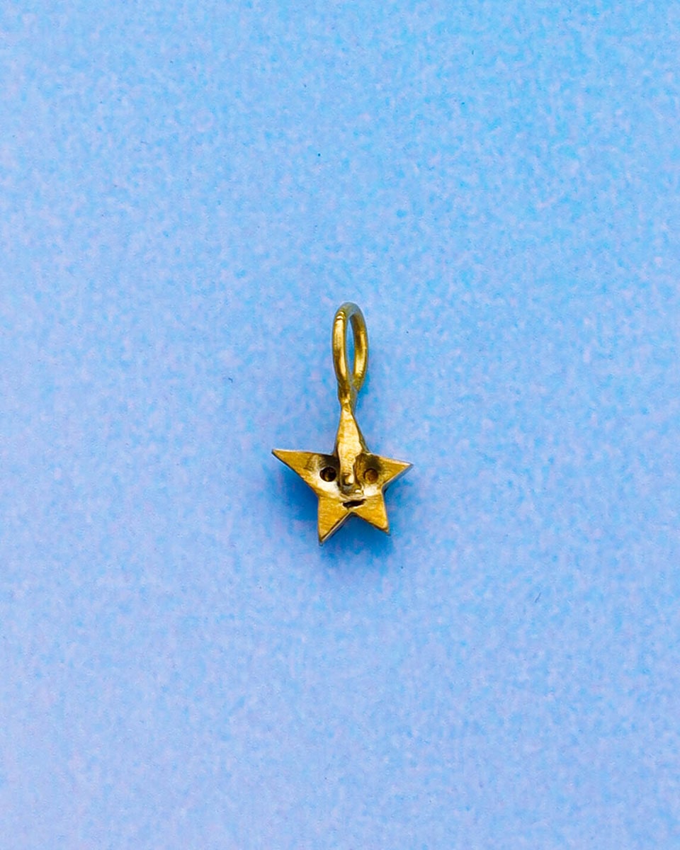 solid brass star-shaped pendant 