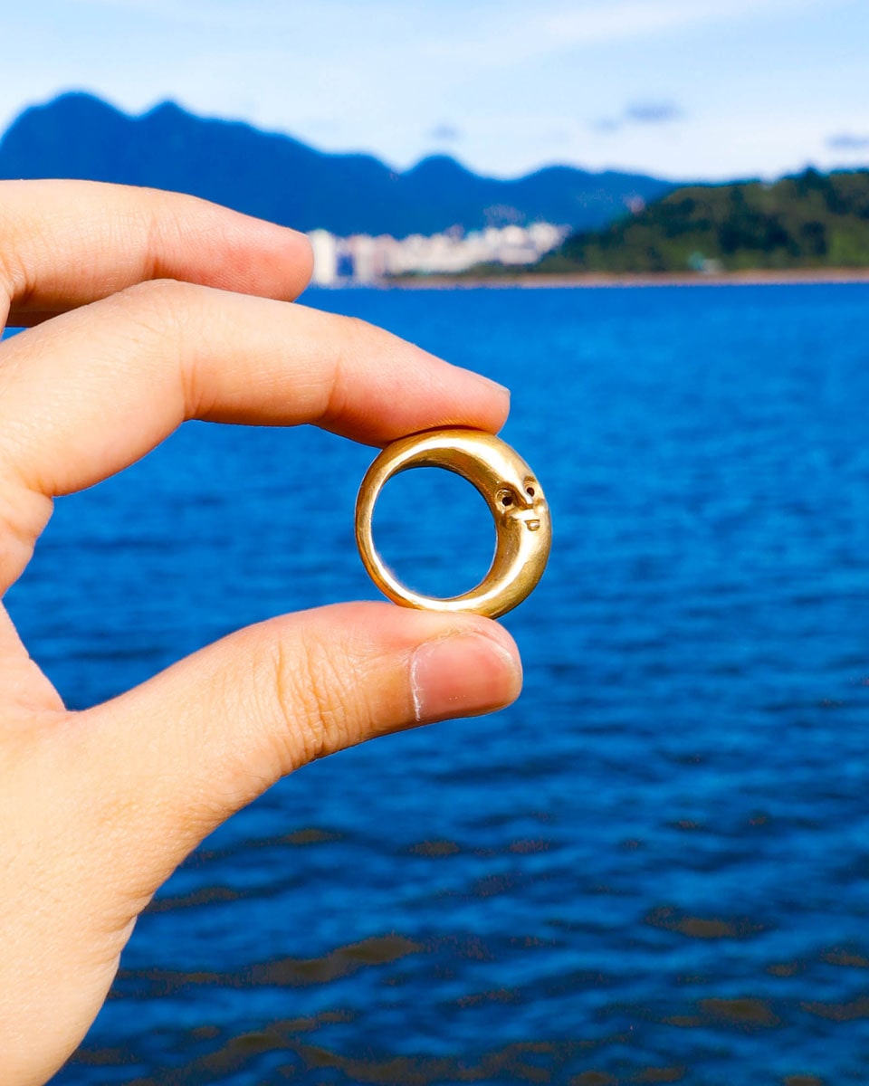 Solid brass Celestial full Moon Ring for Mid-Autumn Festival, featuring moon faces on the sides symbolizing family reunion and harmony