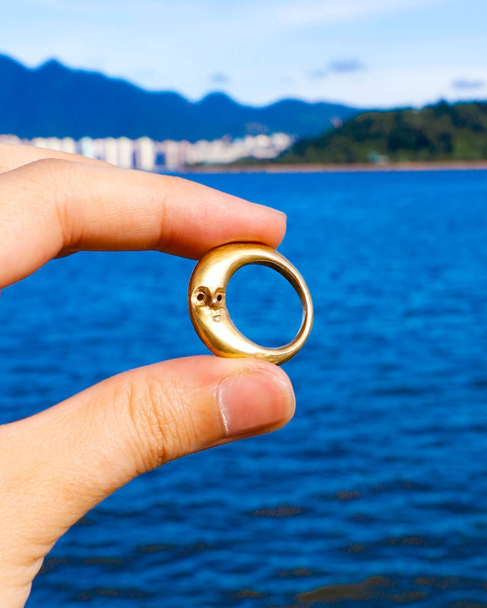 Solid brass Celestial full Moon Ring for Mid-Autumn Festival, featuring moon faces on the sides symbolizing family reunion and harmony