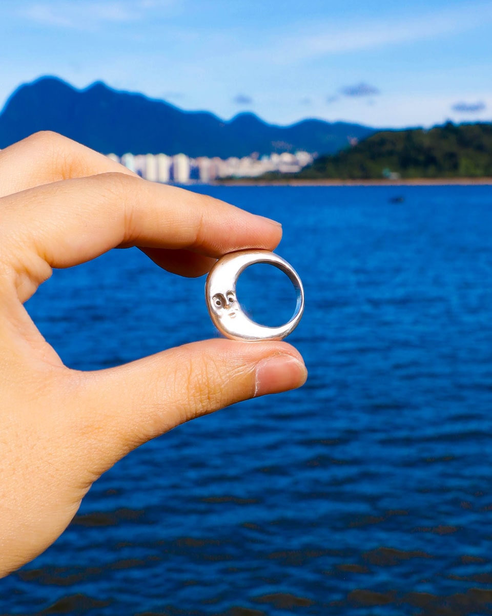Solid sterling silver Celestial full Moon Ring for Mid-Autumn Festival, featuring moon faces on the sides symbolizing family reunion and harmony