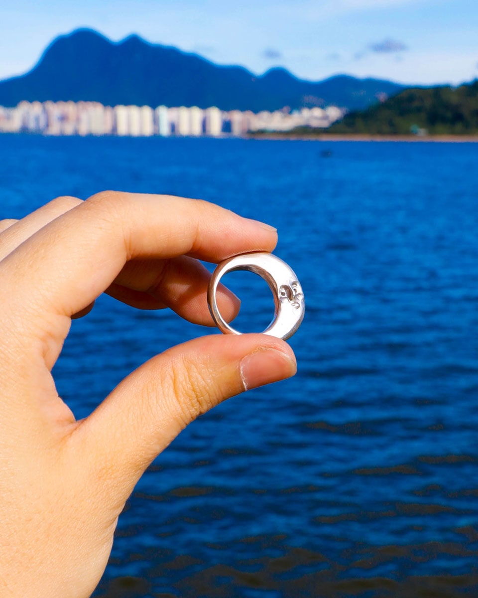 Solid sterling silver Celestial full Moon Ring for Mid-Autumn Festival, featuring moon faces on the sides symbolizing family reunion and harmony