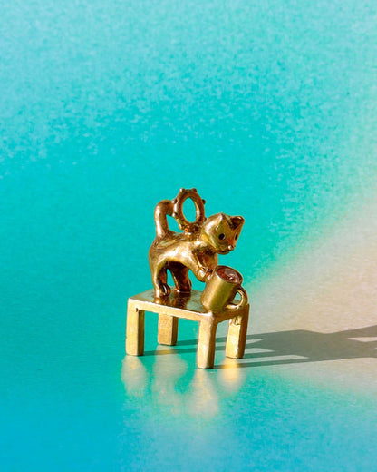 naughty kitty charm, cat pushing cup off table, set with cz stone, handmade jewellery, by fake plastic love