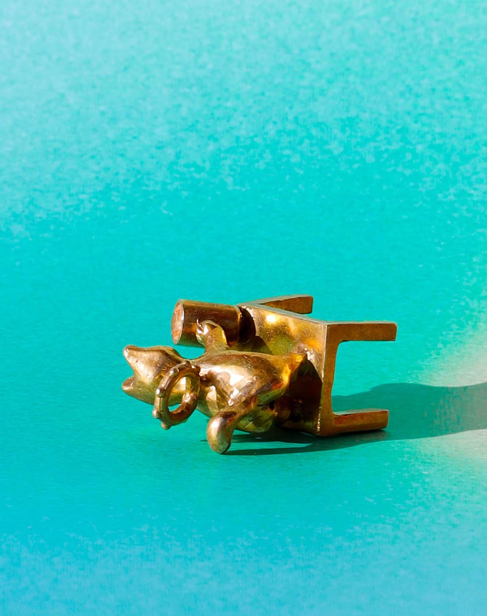 solid brass naughty kitty charm, cat pushing cup off table, set with cz stone, handmade jewellery, by fake plastic love