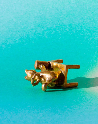 solid brass naughty kitty charm, cat pushing cup off table, set with cz stone, handmade jewellery, by fake plastic love