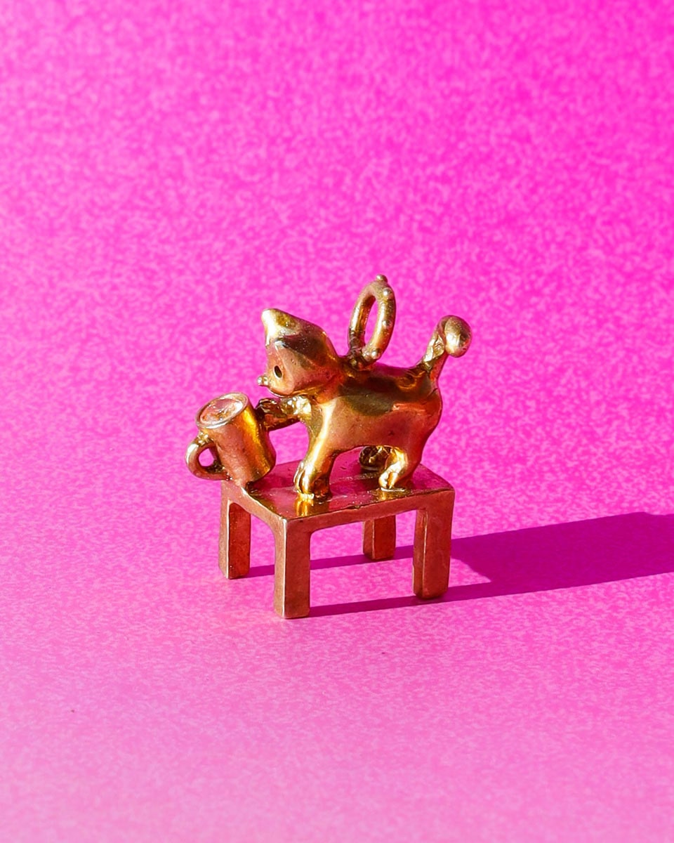 solid brass naughty kitty charm, cat pushing cup off table, set with cz stone, handmade jewellery, by fake plastic love