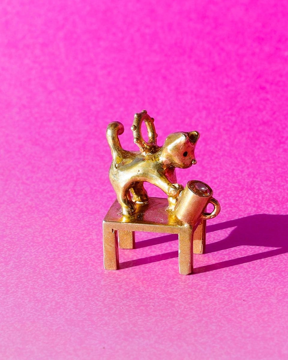 solid brass naughty kitty charm, cat pushing cup off table, set with cz stone, handmade jewellery, by fake plastic love