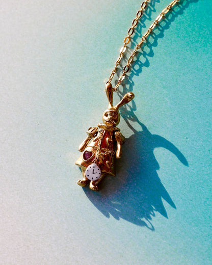 Articulated White Rabbit pendant in brass with moving parts, Alice in wonderland inspired handmade jewellery, with enamel clock, and magenta CZ stone, by fake plastic love
