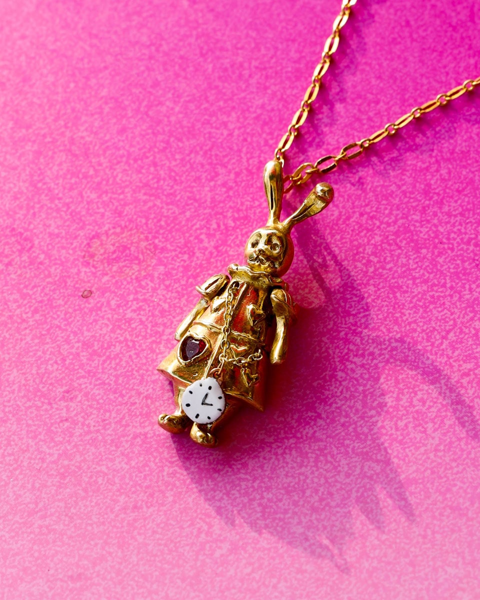 Articulated White Rabbit pendant in brass with moving parts, Alice in wonderland inspired handmade jewellery, with enamel clock, and magenta CZ stone, by fake plastic love