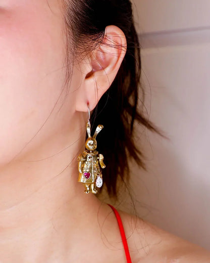 Articulated White Rabbit Earring with moving parts, Alice in wonderland inspired handmade jewellery, with enamel clock, and magenta CZ stone, by fake plastic love