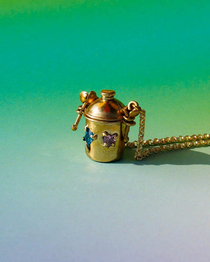 The Alchemist Locket Necklace, a handmade brass tiny container locket with cz stones and flowers details with gold plated chain, crafted by fake plastic love