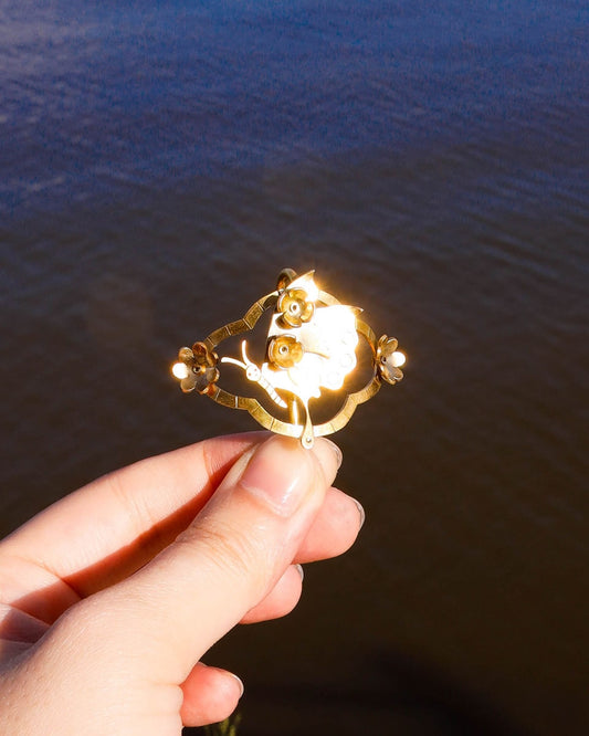 Butterfly hair cuff with a smiley face in brass with floral and heart designs, pony tail hook handmade by fake plastic love
