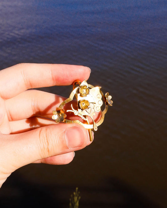 Butterfly hair cuff with a smiley face in brass with floral and heart designs, pony tail hook handmade by fake plastic love