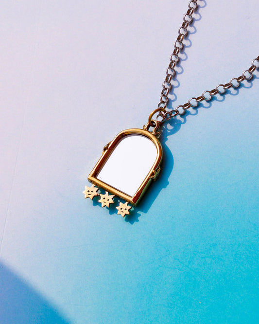Miniature arched shape mirror pendant in brass with sterling silver necklace