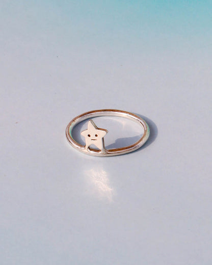 sterling Silver thin band ring with a star design 