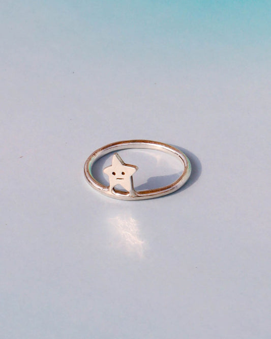 sterling Silver thin band ring with a star design 