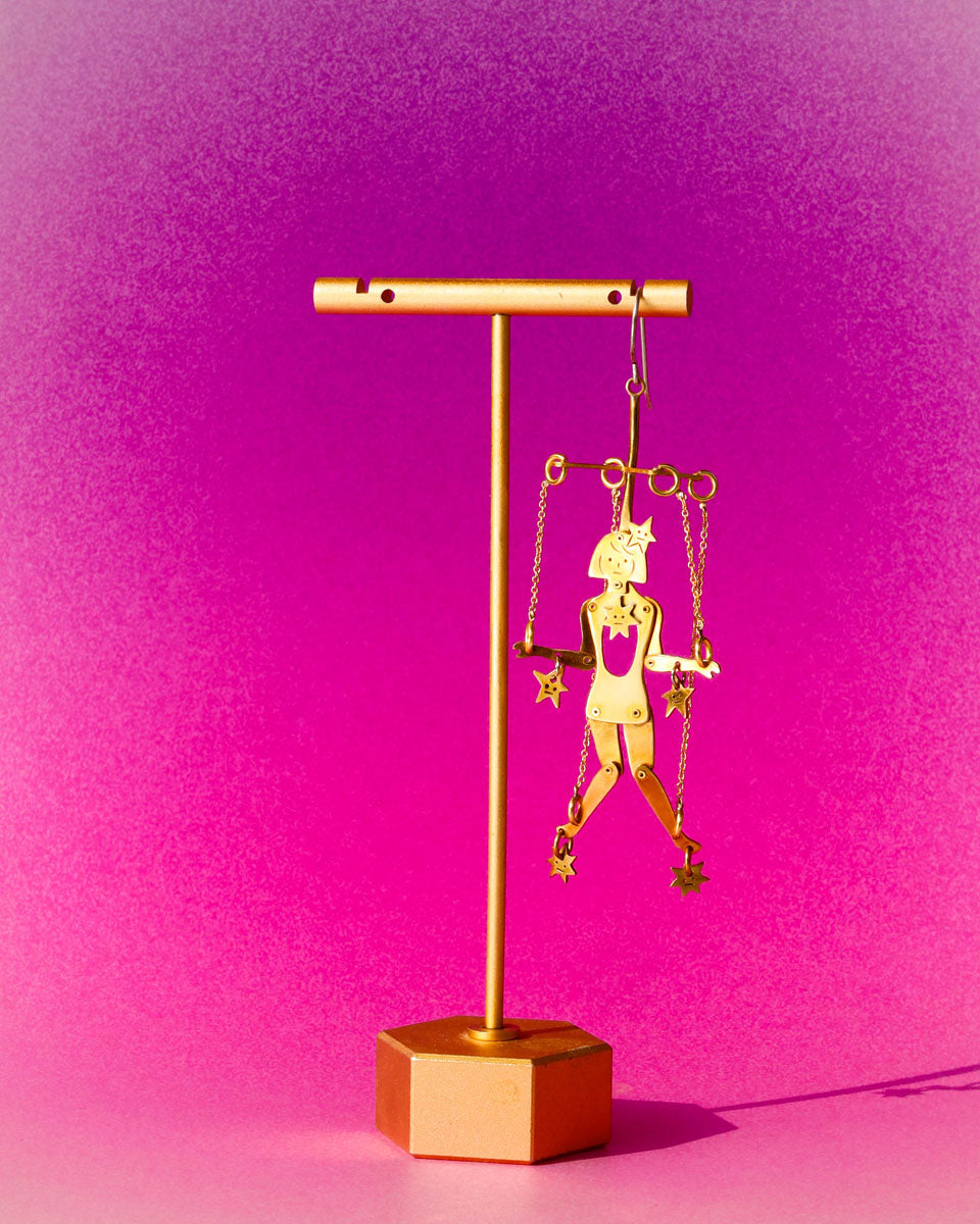 Handmade articulated puppet earrings in brass, “The Person Controlled By The Stars Mini”, sculptural statement jewelry with jointed moving parts