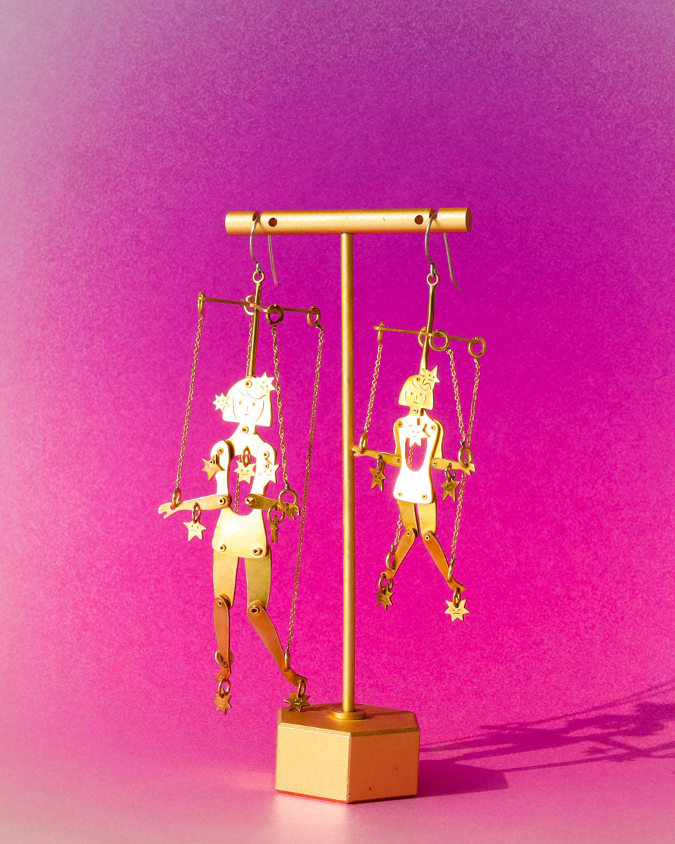 Kinetic puppet earrings with moving joints in brass, handmade statement jewelry inspired by stars and extra-terrestrial