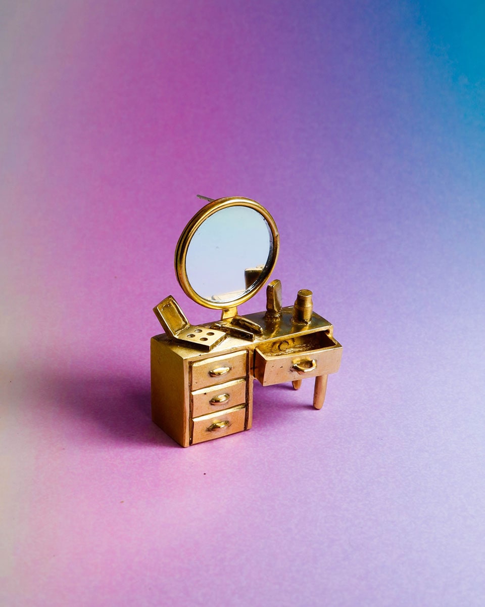 Wearable miniature makeup vanity, handcrafted art jewelry from Room Collection