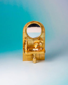 Wearable miniature sink art jewelry, handcrafted in brass