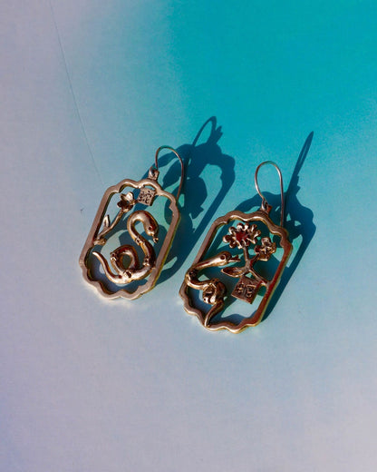 Handcrafted Year of the Snake earrings inspired by Chinese New Year 2025, designed by Scarlett Poon of Fake Plastic Love