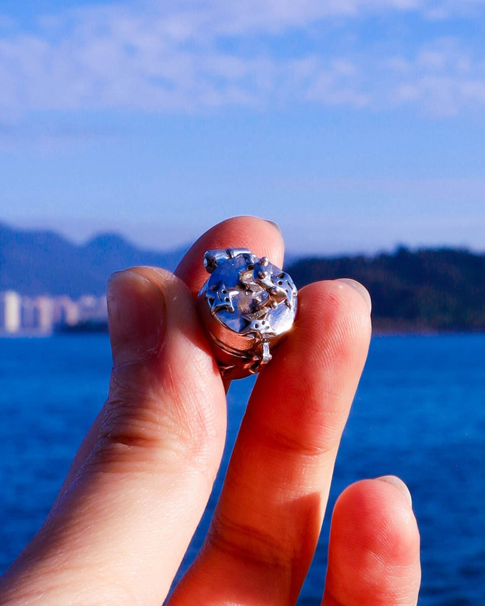 a solid sterling silver locket with stars design, handmade small container locket pendant