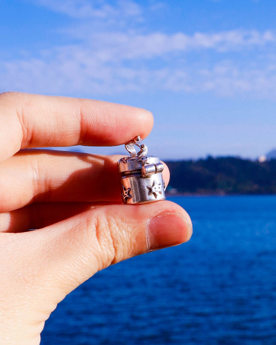 a solid sterling silver locket with stars design, handmade small container locket pendant