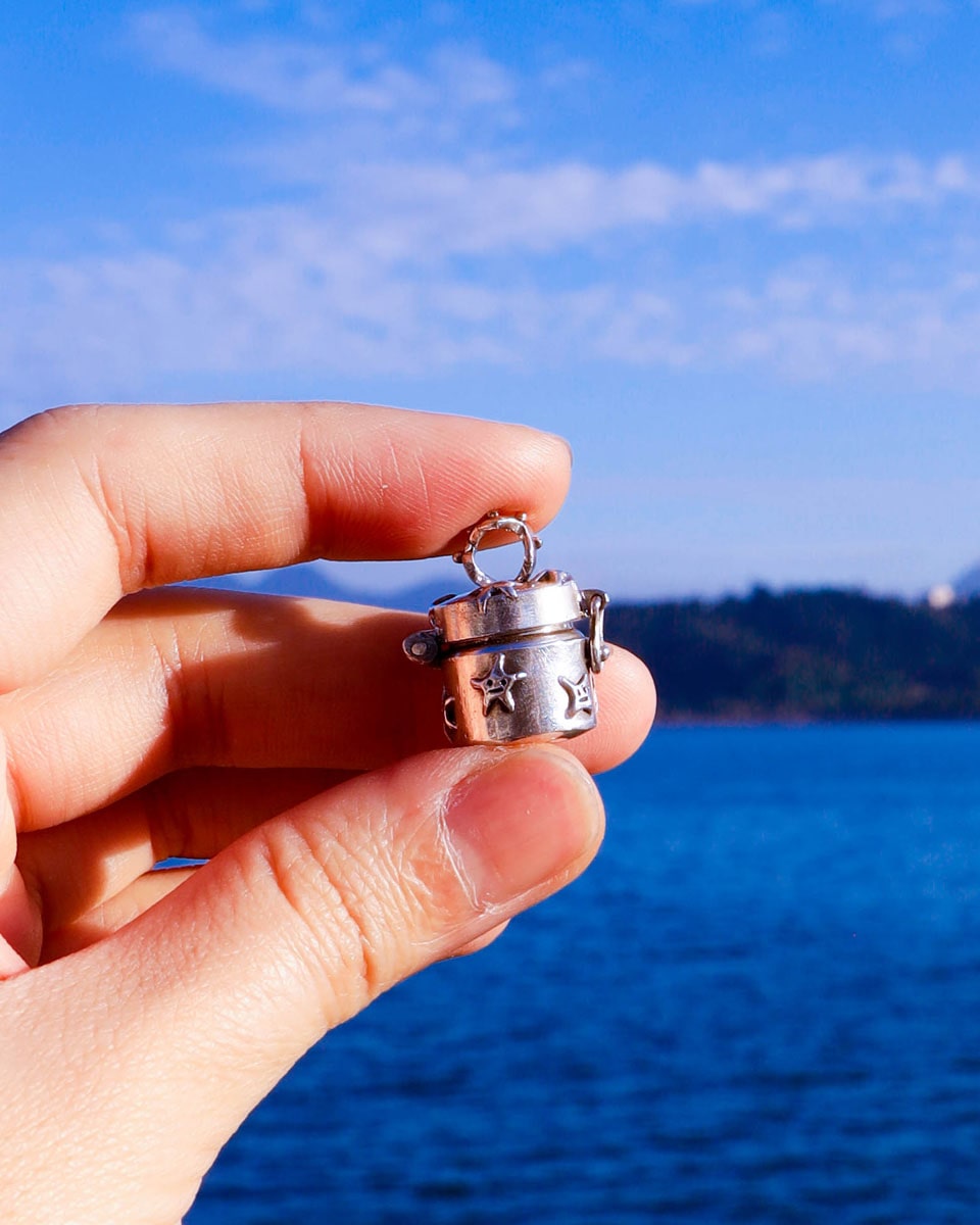 a solid sterling silver locket with stars design, handmade small container locket pendant
